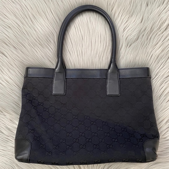 Gucci Handbags - GUCCI Monogram Canvas and Leather Zip Tote
